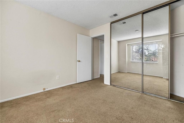 24232 Sylvan Glen Rd Unit A, Diamond Bar, CA 91765 - unfurnished bedroom with carpet floors, a textured ceiling, and a closet