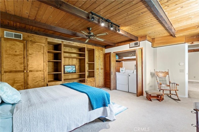423 Thousand Pines Rd, Crestline, CA 92325 - carpeted bedroom with washer and dryer, a wood ceiling with exposed beams, and rail lighting