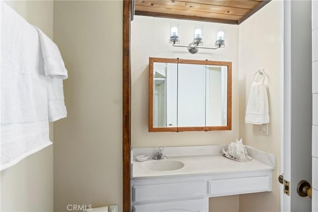 423 Thousand Pines Rd, Crestline, CA 92325 - bathroom featuring wooden ceiling and vanity