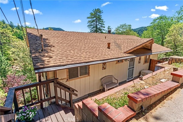 423 Thousand Pines Rd, Crestline, CA 92325 - back of house featuring roof with shingles and a wooden deck