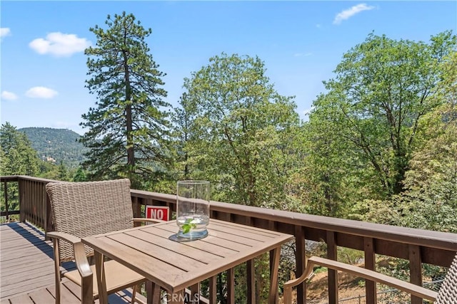 423 Thousand Pines Rd, Crestline, CA 92325 - deck with outdoor dining space and a mountain view