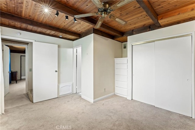 423 Thousand Pines Rd, Crestline, CA 92325 - unfurnished bedroom with a wooden ceiling with exposed beams, light carpet, and a closet