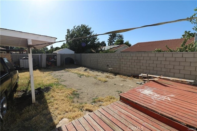 4537 Elwood Ave, Palmdale, CA 93552 - fenced backyard featuring a deck
