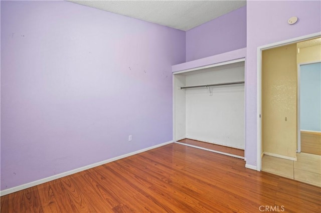37702 Medea Ct, Palmdale, CA 93550 - unfurnished bedroom with wood finished floors and a closet
