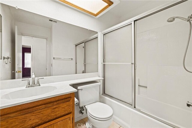37702 Medea Ct, Palmdale, CA 93550 - full bathroom featuring vanity and shower / bath combination with glass door