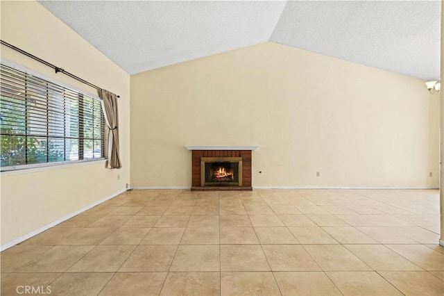37702 Medea Ct, Palmdale, CA 93550 - unfurnished living room with vaulted ceiling, a textured ceiling, light tile patterned floors, and a fireplace