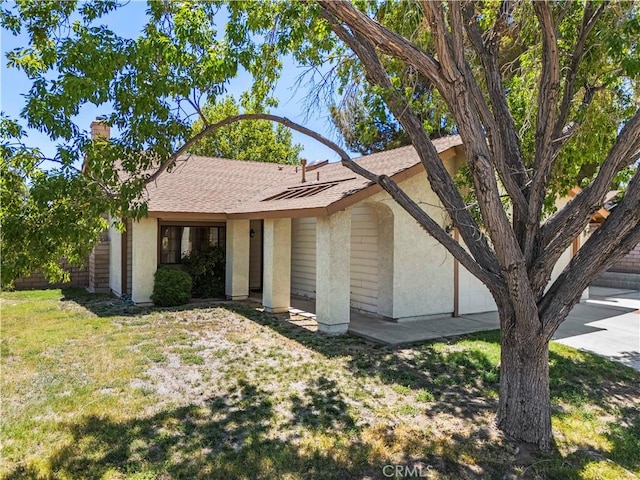 37702 Medea Ct, Palmdale, CA 93550 - ranch-style home featuring stucco siding, a front yard, roof with shingles, and a chimney