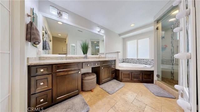 7413 Crimson Dr, Highland, CA 92346 - full bathroom featuring a stall shower, vanity, a bath, stone tile flooring, and recessed lighting