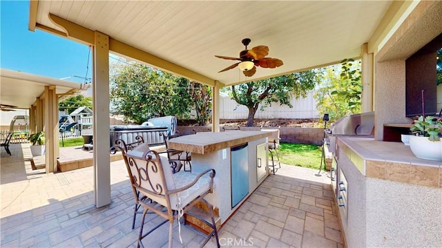 7413 Crimson Dr, Highland, CA 92346 - view of patio featuring area for grilling and ceiling fan