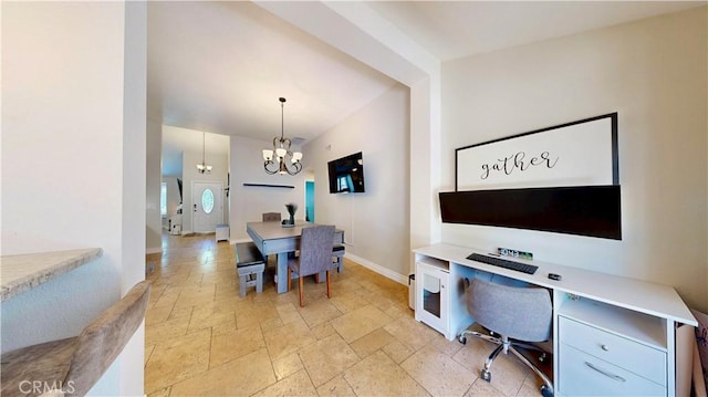 7413 Crimson Dr, Highland, CA 92346 - dining space with stone tile floors, an office area, and a chandelier