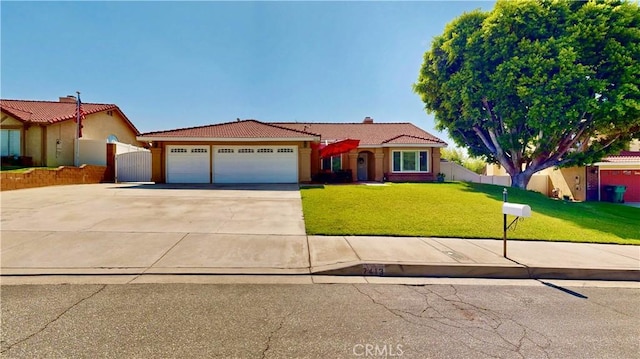 7413 Crimson Dr, Highland, CA 92346 - view of front of house with a tiled roof, an attached garage, concrete driveway, and stucco siding