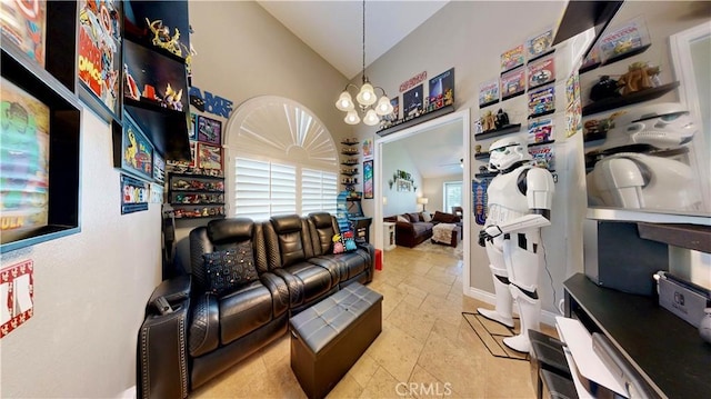 7413 Crimson Dr, Highland, CA 92346 - living room with lofted ceiling, stone tile floors, and a chandelier