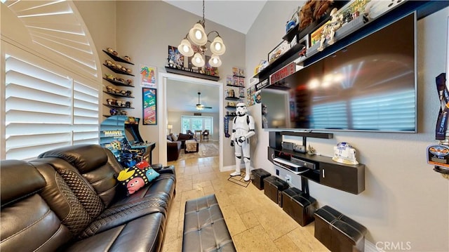 7413 Crimson Dr, Highland, CA 92346 - living room with a high ceiling, ceiling fan, and stone tile flooring