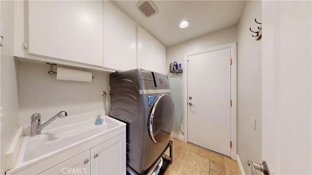 7413 Crimson Dr, Highland, CA 92346 - laundry area with washer / clothes dryer, cabinet space, stone tile flooring, and recessed lighting