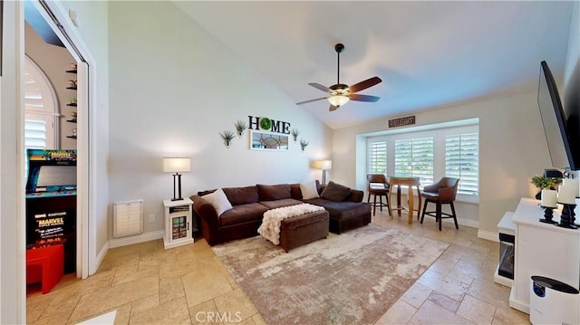 7413 Crimson Dr, Highland, CA 92346 - living room featuring stone tile flooring, a ceiling fan, and high vaulted ceiling