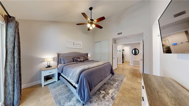 7413 Crimson Dr, Highland, CA 92346 - bedroom featuring ceiling fan and light stone finish flooring