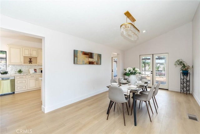 16066 Rancho Verde Cir, Riverside, CA 92506 - dining space with light wood-style flooring, lofted ceiling, and recessed lighting