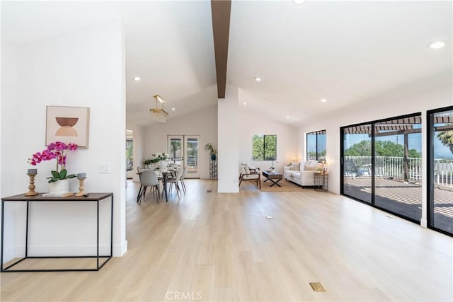 16066 Rancho Verde Cir, Riverside, CA 92506 - living room featuring beam ceiling, light wood finished floors, recessed lighting, and high vaulted ceiling