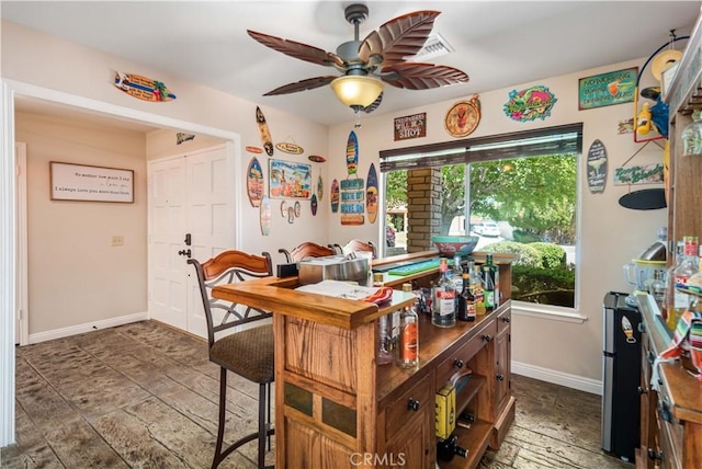 2608 Nice Ct, Lancaster, CA 93536 - home office featuring ceiling fan and baseboards