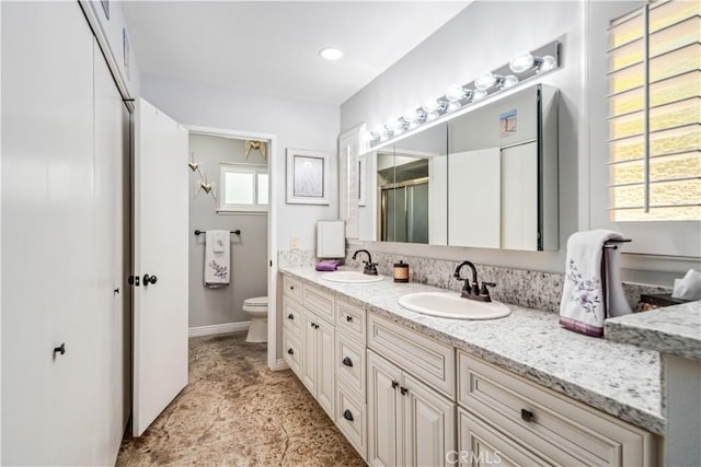 2608 Nice Ct, Lancaster, CA 93536 - full bath featuring double vanity and a shower with shower door