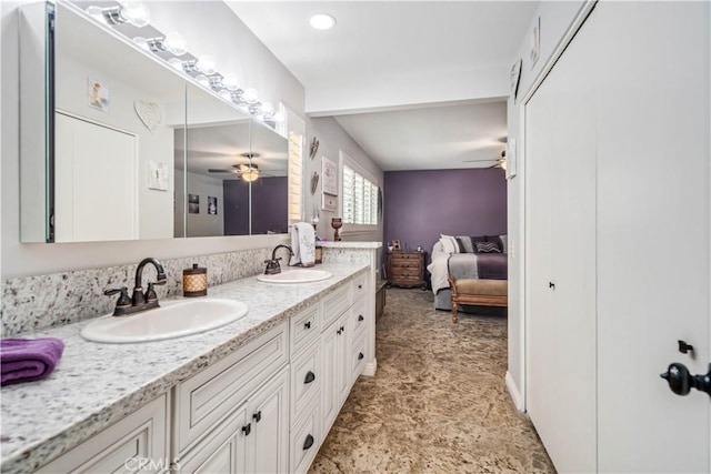 2608 Nice Ct, Lancaster, CA 93536 - ensuite bathroom featuring ceiling fan and double vanity