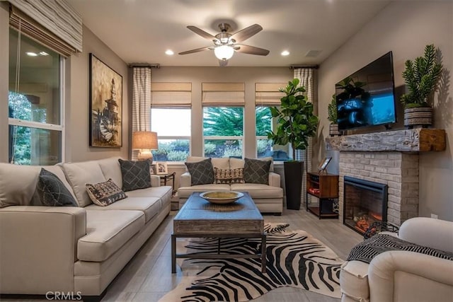 1170 Spring Azure Way Unit 45, Nipomo, CA 93444 - living area with light wood-style flooring, a ceiling fan, a brick fireplace, and recessed lighting