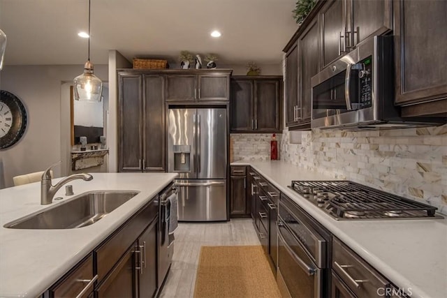 1170 Spring Azure Way Unit 45, Nipomo, CA 93444 - kitchen with appliances with stainless steel finishes, light countertops, dark brown cabinets, tasteful backsplash, and recessed lighting
