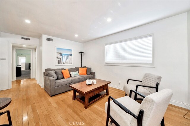 217 E Balboa Blvd, Newport Beach, CA 92661 - living room featuring light wood-style flooring and recessed lighting