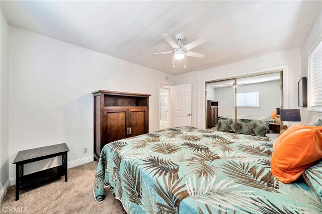 217 E Balboa Blvd, Newport Beach, CA 92661 - bedroom with light carpet, a closet, and a ceiling fan