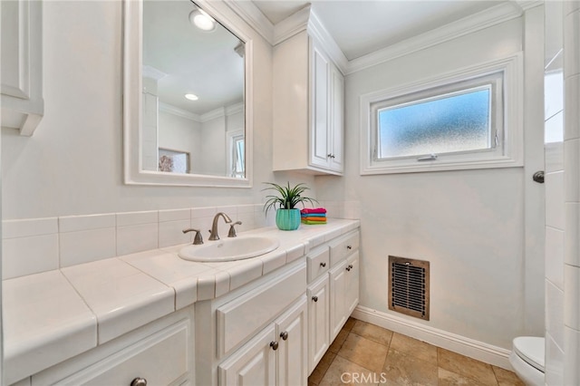 217 E Balboa Blvd, Newport Beach, CA 92661 - bathroom with ornamental molding, vanity, and tasteful backsplash