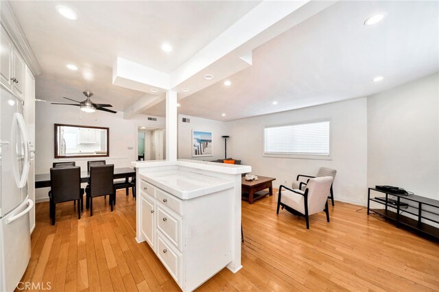 217 E Balboa Blvd, Newport Beach, CA 92661 - kitchen featuring freestanding refrigerator, tile countertops, white cabinets, light wood-type flooring, and recessed lighting