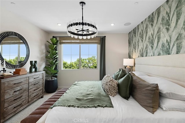 12247 Elliott Ave Unit F, El Monte, CA 91732 - bedroom with an accent wall, a chandelier, and recessed lighting