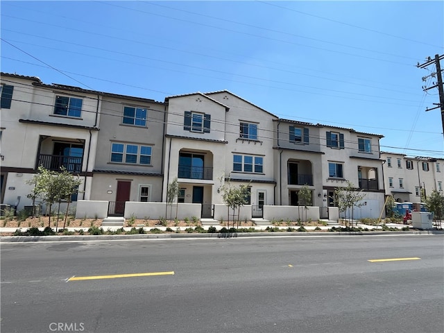 12247 Elliott Ave Unit F, El Monte, CA 91732 - townhome / multi-family property featuring stucco siding