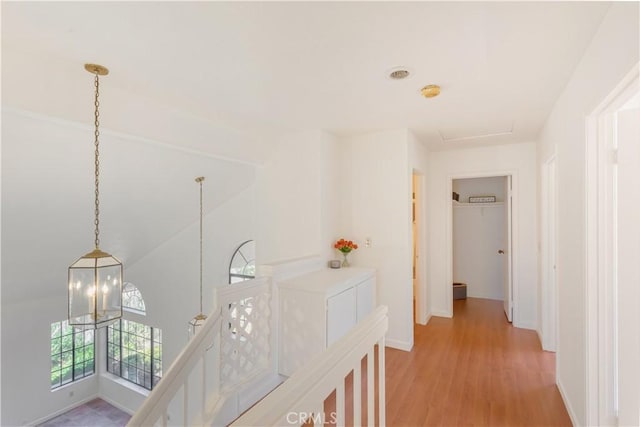 24249 Saradella Ct, Murrieta, CA 92562 - hall featuring an upstairs landing and light wood-type flooring