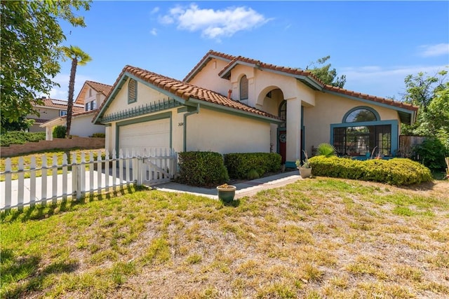 24249 Saradella Ct, Murrieta, CA 92562 - view of front facade featuring a garage, stucco siding, a tile roof, and driveway