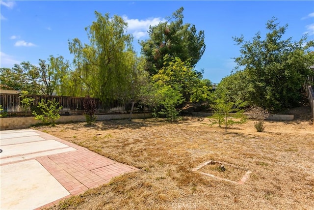 24249 Saradella Ct, Murrieta, CA 92562 - fenced backyard featuring a patio area