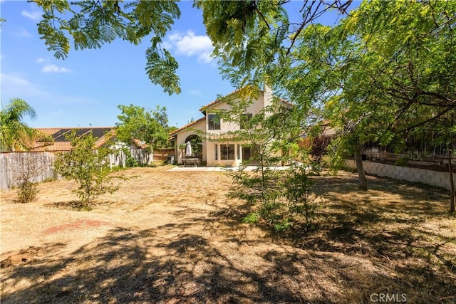 24249 Saradella Ct, Murrieta, CA 92562 - fenced backyard with a patio