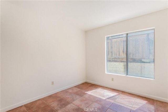 24249 Saradella Ct, Murrieta, CA 92562 - empty room with baseboards