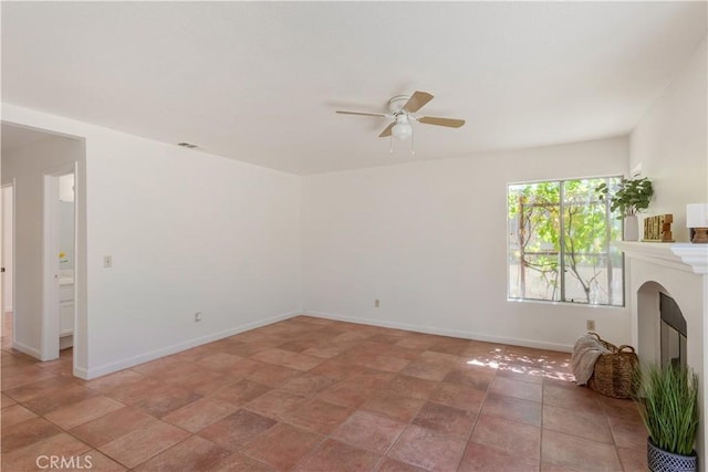 24249 Saradella Ct, Murrieta, CA 92562 - unfurnished living room with ceiling fan and a glass covered fireplace