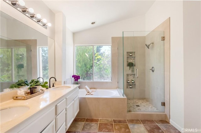 24249 Saradella Ct, Murrieta, CA 92562 - bathroom with a shower stall, a garden tub, lofted ceiling, and double vanity