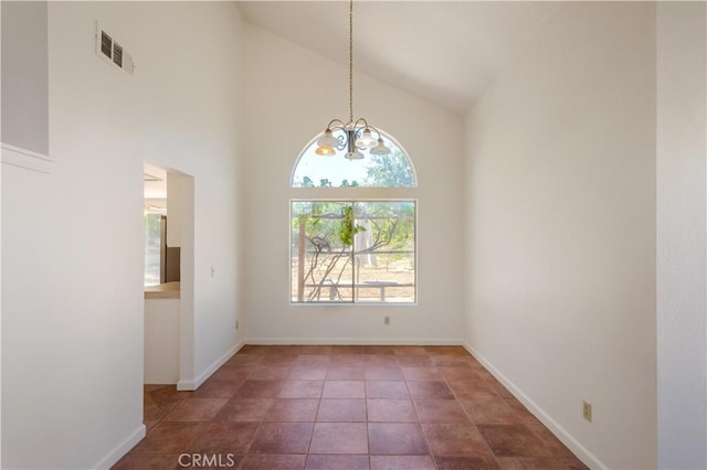 24249 Saradella Ct, Murrieta, CA 92562 - empty room featuring a chandelier and high vaulted ceiling
