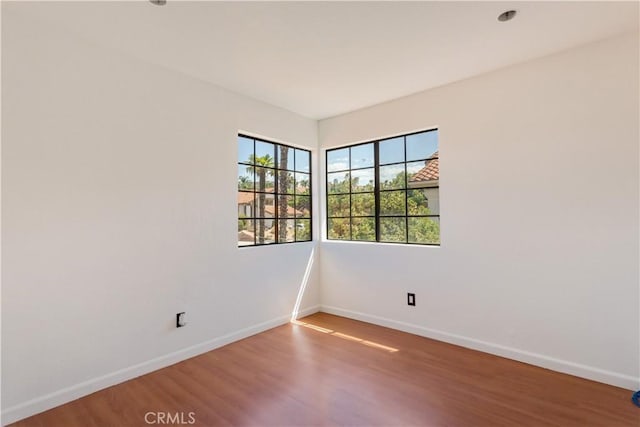 24249 Saradella Ct, Murrieta, CA 92562 - empty room featuring wood finished floors