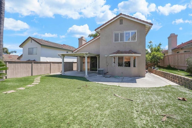 1930 Rosewood St, Vista, CA 92081 - back of property featuring a patio area, a fenced backyard, stucco siding, and a chimney