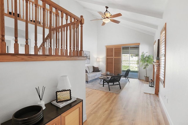 1930 Rosewood St, Vista, CA 92081 - living area featuring light wood finished floors, a ceiling fan, and high vaulted ceiling
