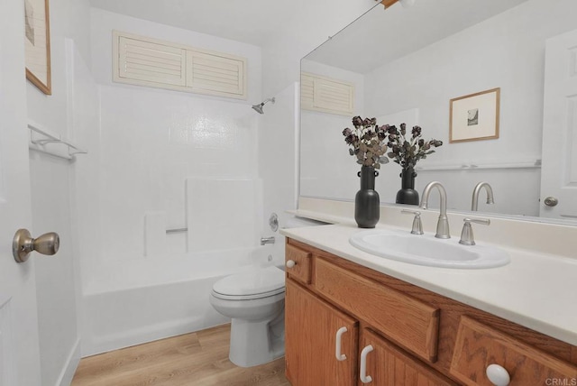 1930 Rosewood St, Vista, CA 92081 - bathroom with vanity, washtub / shower combination, and wood finished floors