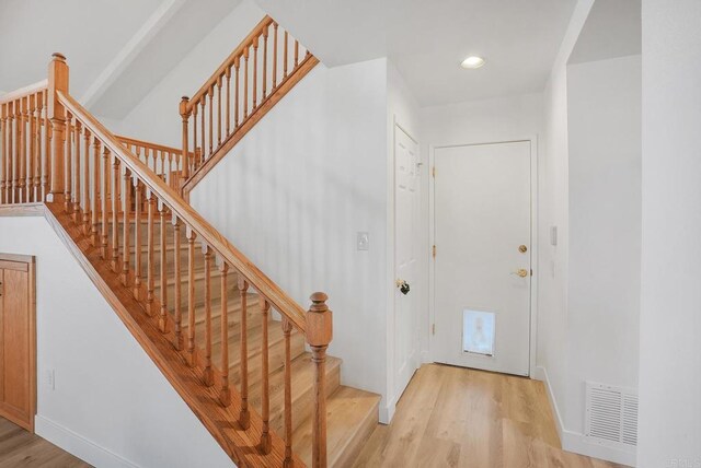 1930 Rosewood St, Vista, CA 92081 - stairway with wood finished floors and recessed lighting