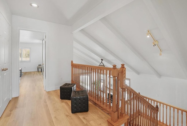 1930 Rosewood St, Vista, CA 92081 - hall with light wood-style flooring and an upstairs landing