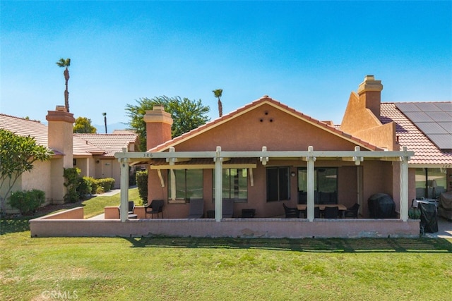 42386 Sultan Ave, Palm Desert, CA 92211 - rear view of house with a yard, a patio area, and stucco siding