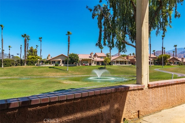 42386 Sultan Ave, Palm Desert, CA 92211 - surrounding community featuring a residential view, a lawn, and a mountain view