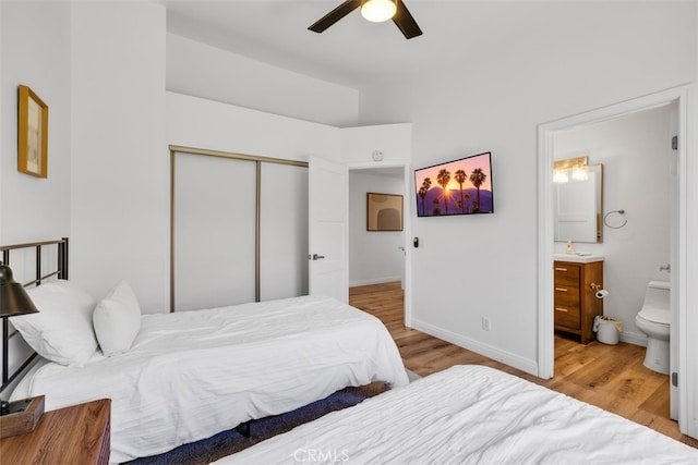 42386 Sultan Ave, Palm Desert, CA 92211 - bedroom featuring a closet, wood finished floors, ensuite bathroom, and a ceiling fan